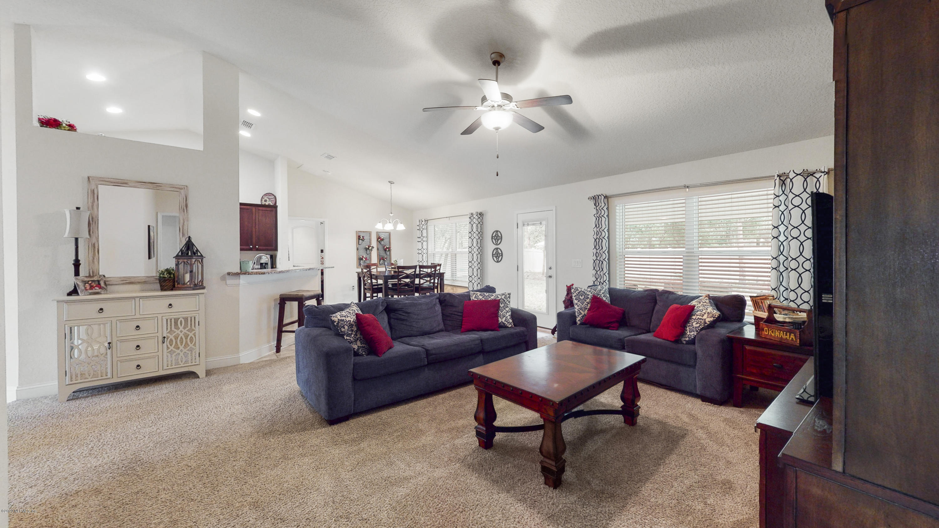 88101 Maybourne Road Yulee, FL 32097 - Photo 7 of 22 a living room with furniture and a window