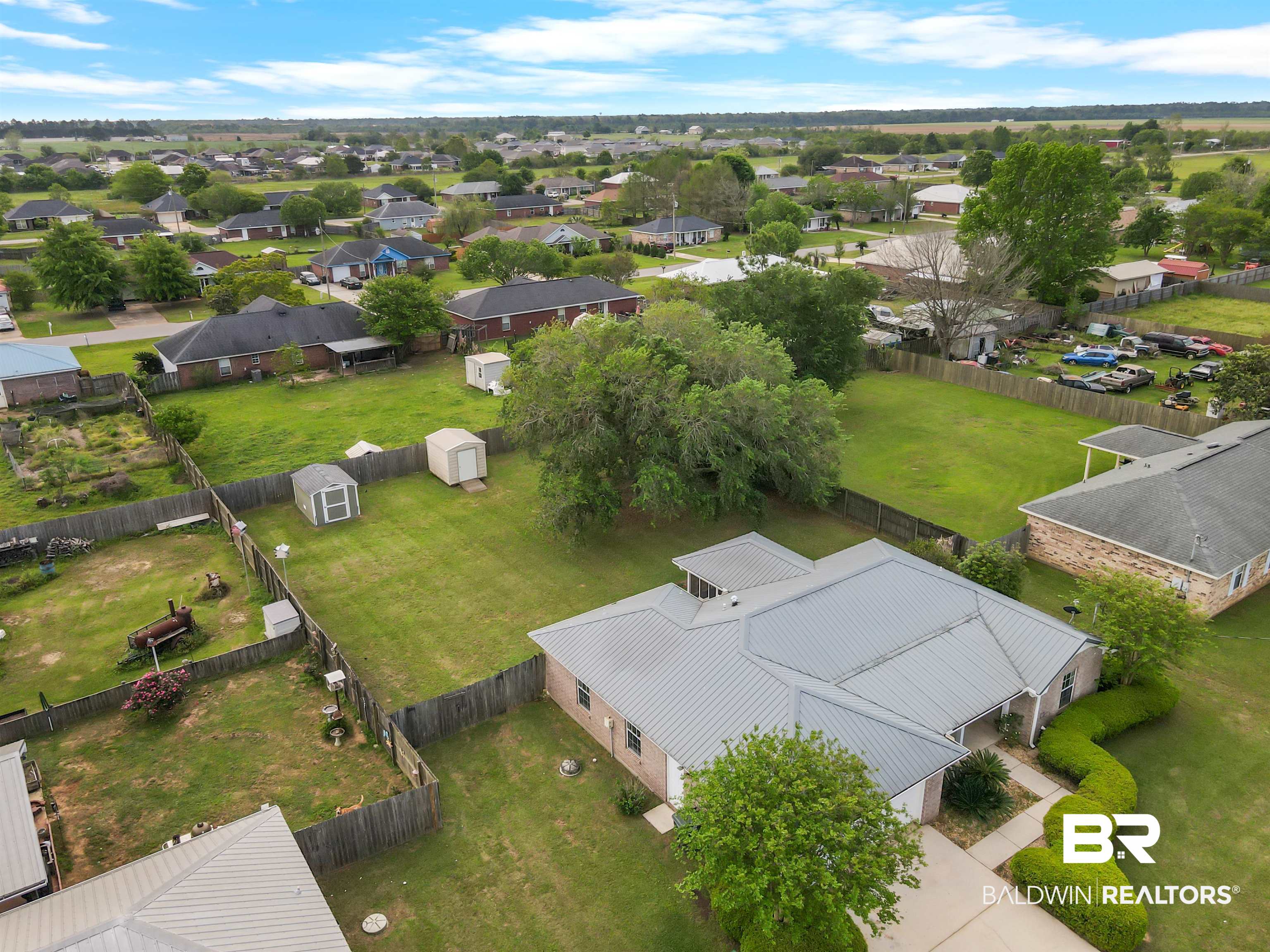 8940 Caitlin Street Foley, AL 36535 - Photo 20 of 27 Aerial perspective of suburban area