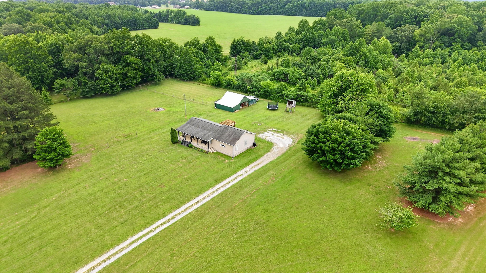 8023 Bethlehem Road Springfield, TN 37172 - Photo 8 of 55 a lush green field with lots of green space