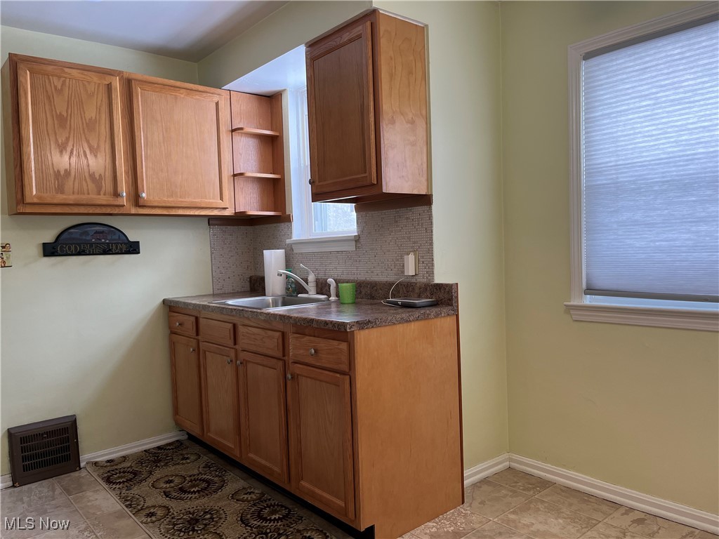 15405 Corkhill Road Maple Heights, OH 44137 - Photo 15 of 50 Kitchen with newer oak cabinets.