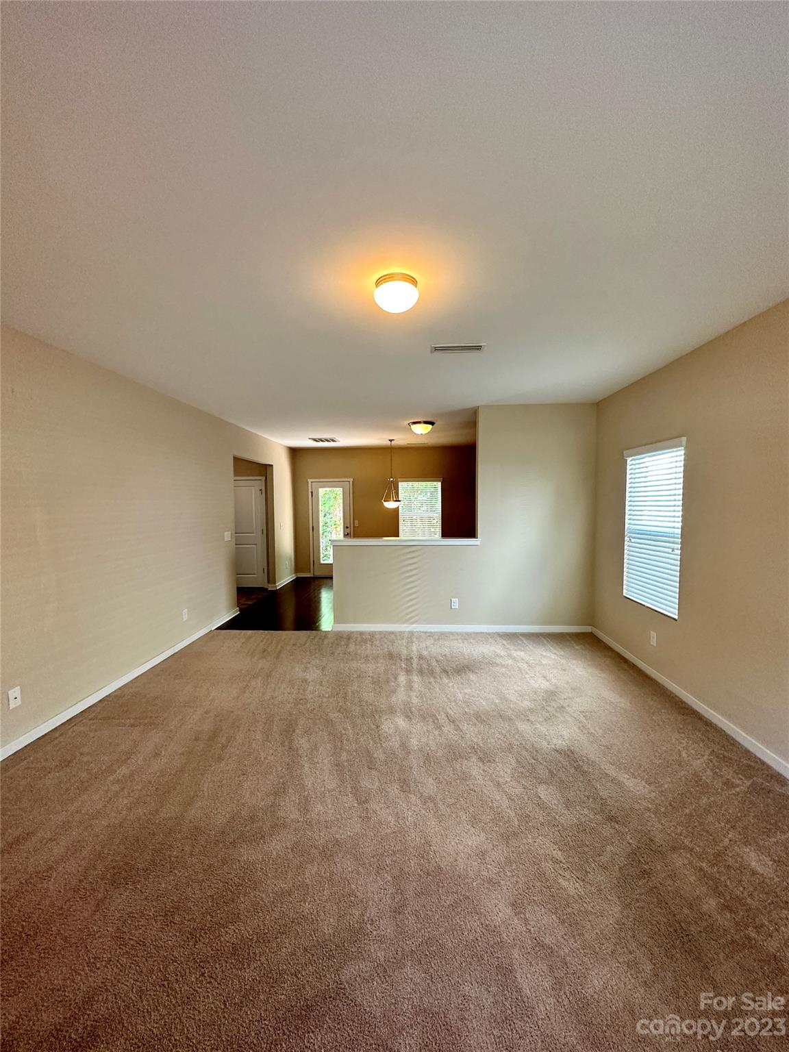 5513 Idlewild Road North Charlotte, NC 28227 - Photo 3 of 18 a view of an empty room with a window