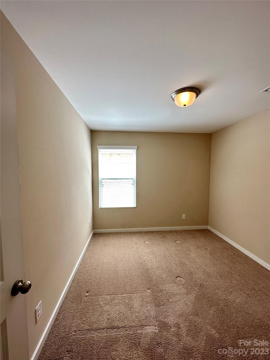 5513 Idlewild Road North Charlotte, NC 28227 - Photo 10 of 18 an empty room with windows