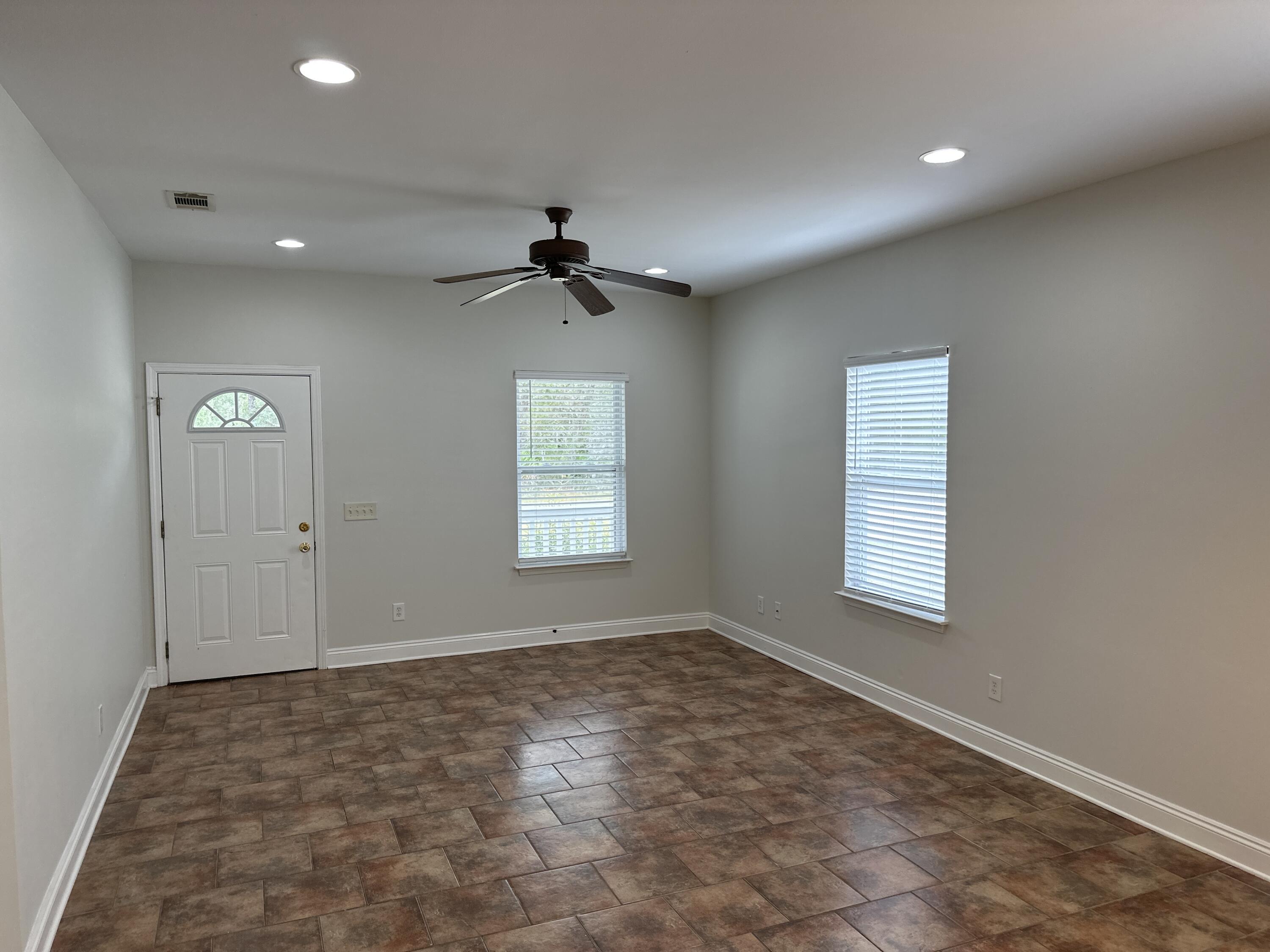 261 County Line Road Niceville, FL 32578 - Photo 5 of 17 an empty room with windows and closet