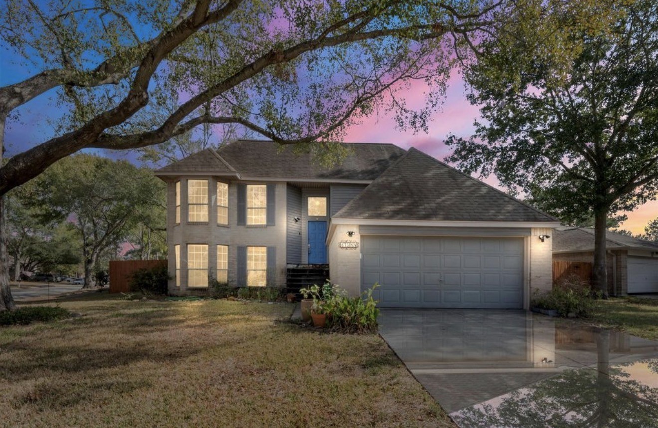 17314 Edenbridge Court Spring, TX 77379 - Photo 2 of 33 a front view of a house with a yard