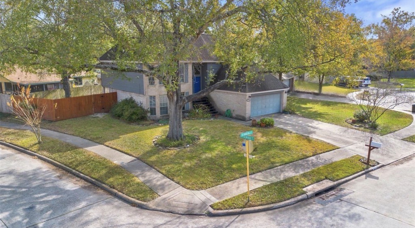 17314 Edenbridge Court Spring, TX 77379 - Photo 3 of 33 a view of a backyard with swimming pool