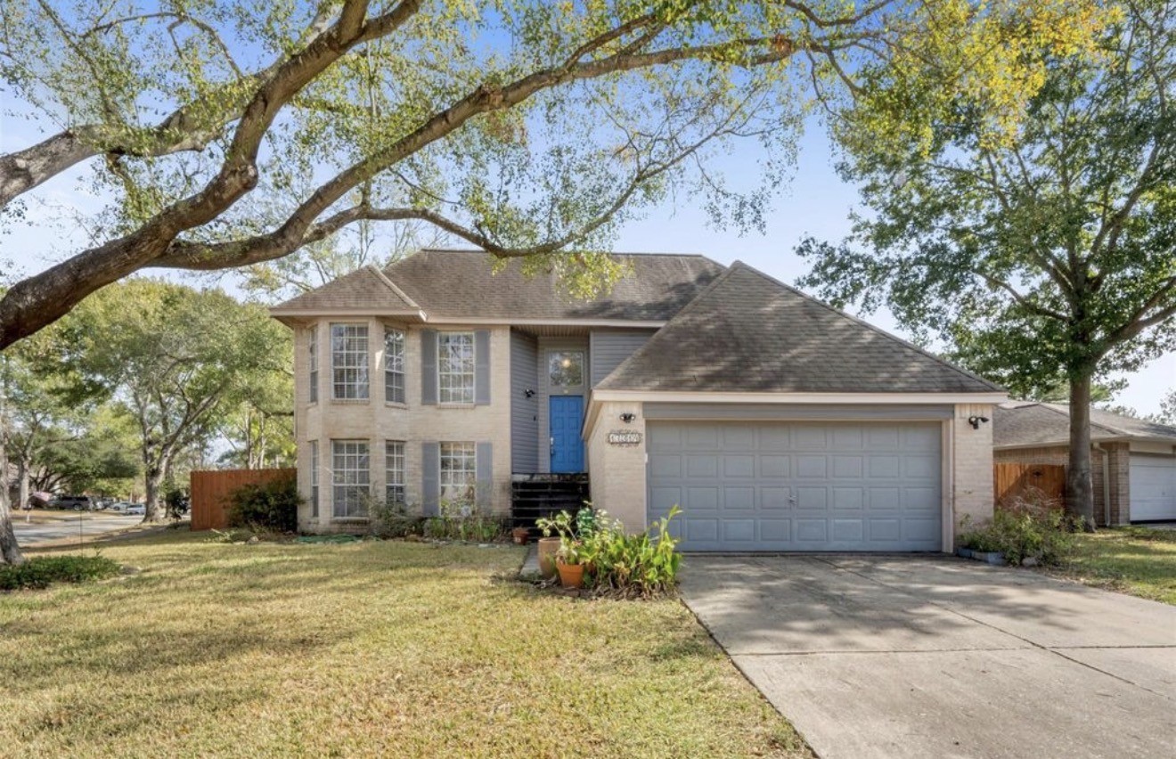 17314 Edenbridge Court Spring, TX 77379 - Photo 33 of 33 a front view of a house with a garden