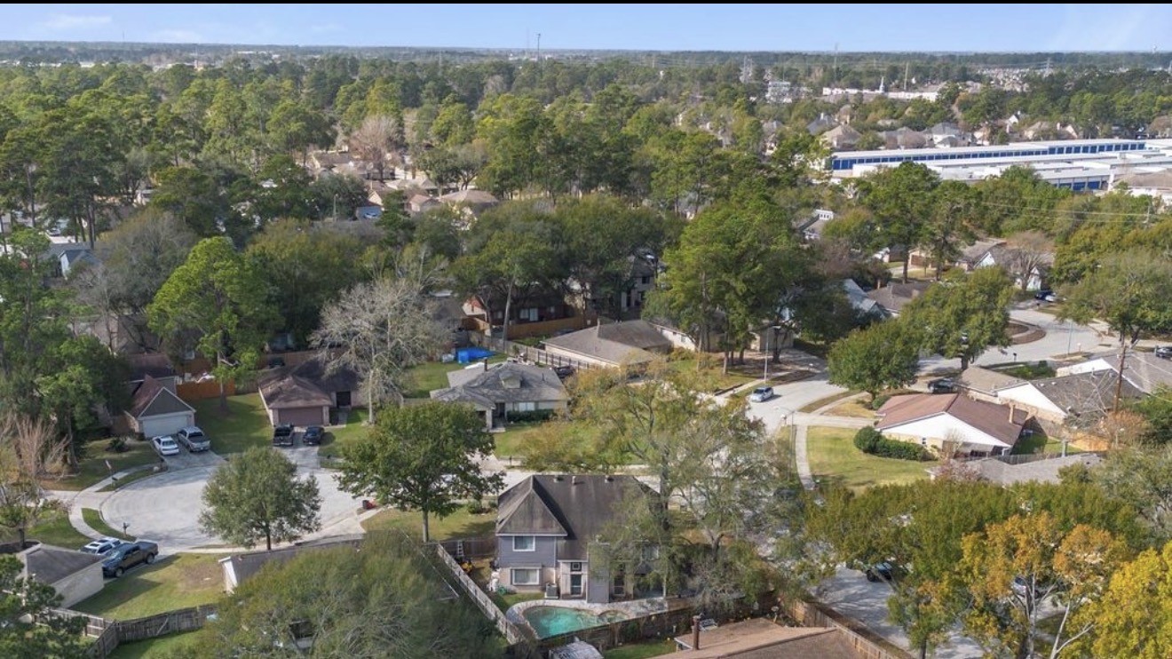 17314 Edenbridge Court Spring, TX 77379 - Photo 4 of 33 an aerial view of residential houses with outdoor space and trees