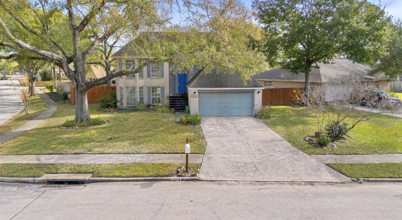 17314 Edenbridge Court Spring, TX 77379 - Photo 7 of 33 a view of backyard with swimming pool