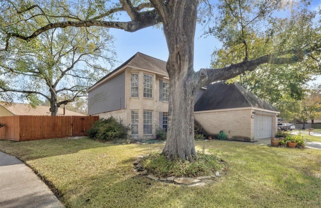 17314 Edenbridge Court Spring, TX 77379 - Photo 8 of 33 a front view of house with yard