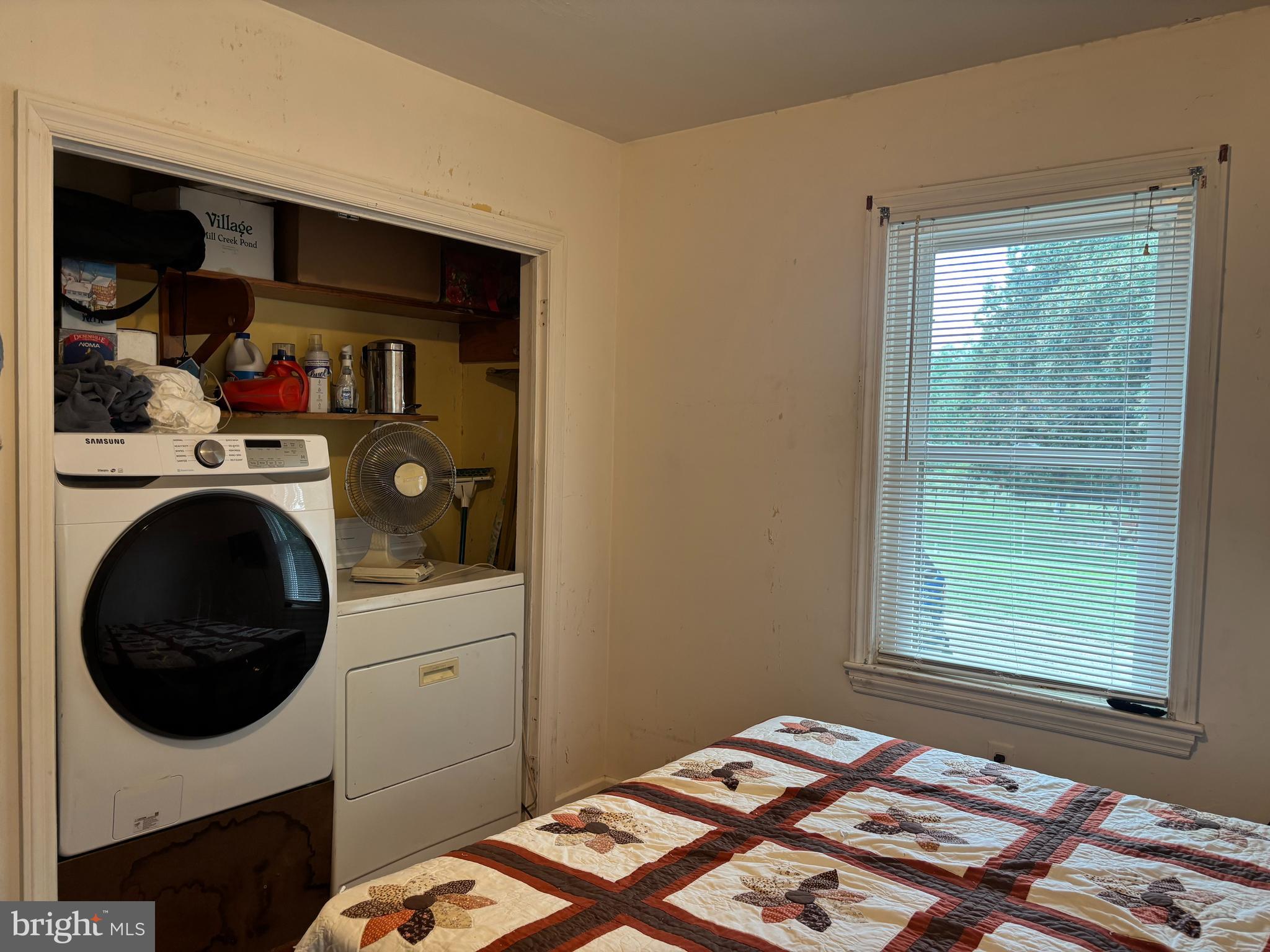 2101 Dudley Corners Road Crumpton, MD 21628 - Photo 17 of 40 a bedroom with a bed and a window