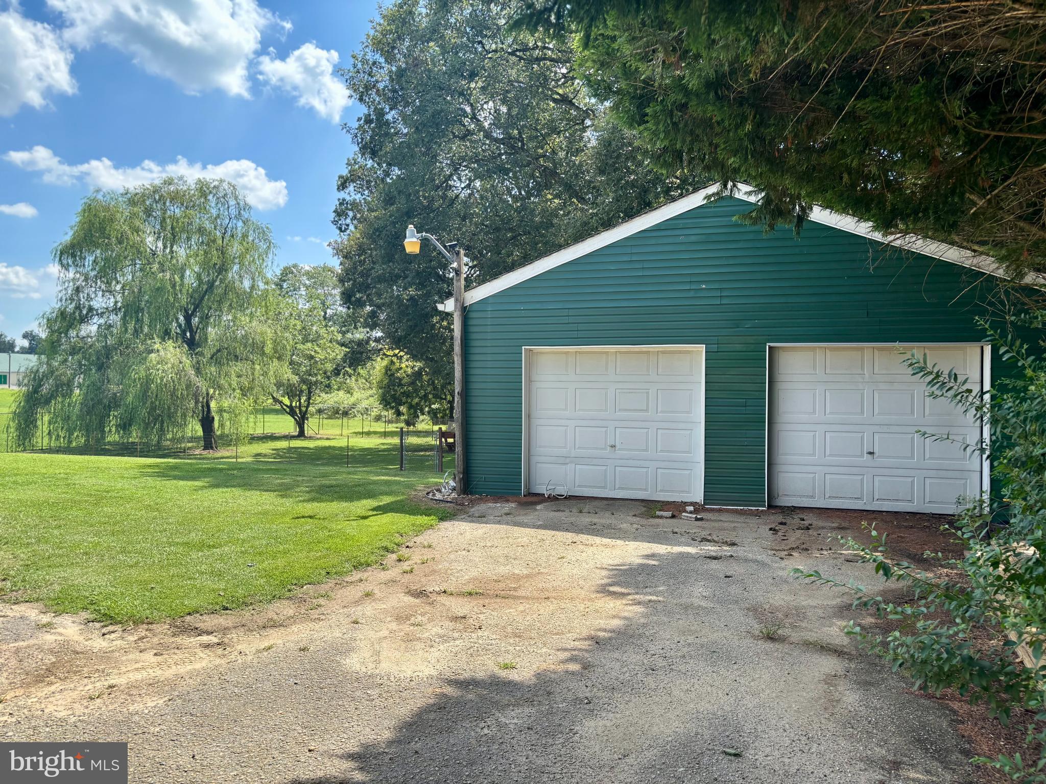 2101 Dudley Corners Road Crumpton, MD 21628 - Photo 24 of 40 a front view of a house with a yard