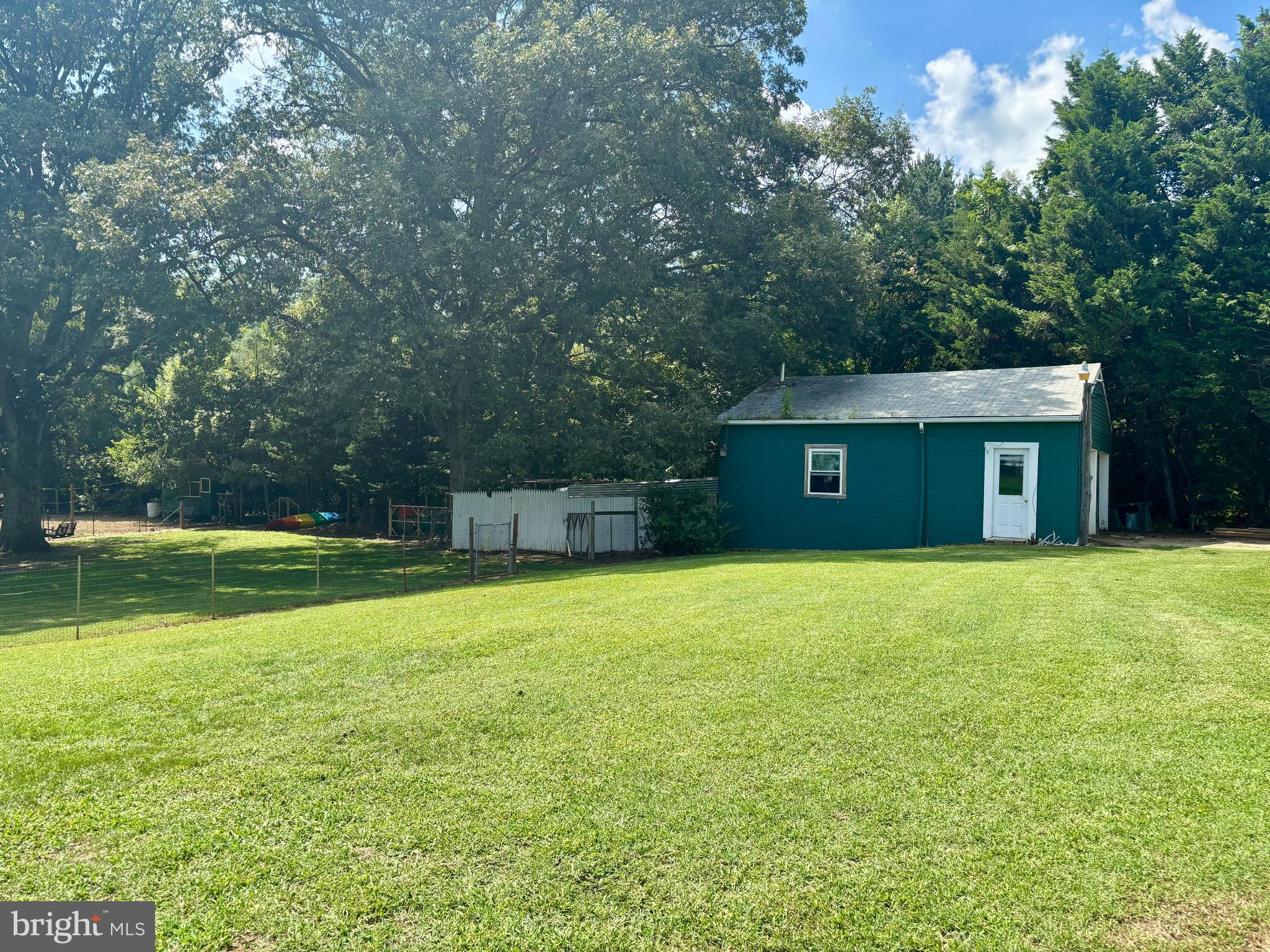 2101 Dudley Corners Road Crumpton, MD 21628 - Photo 28 of 40 a view of a house with a yard