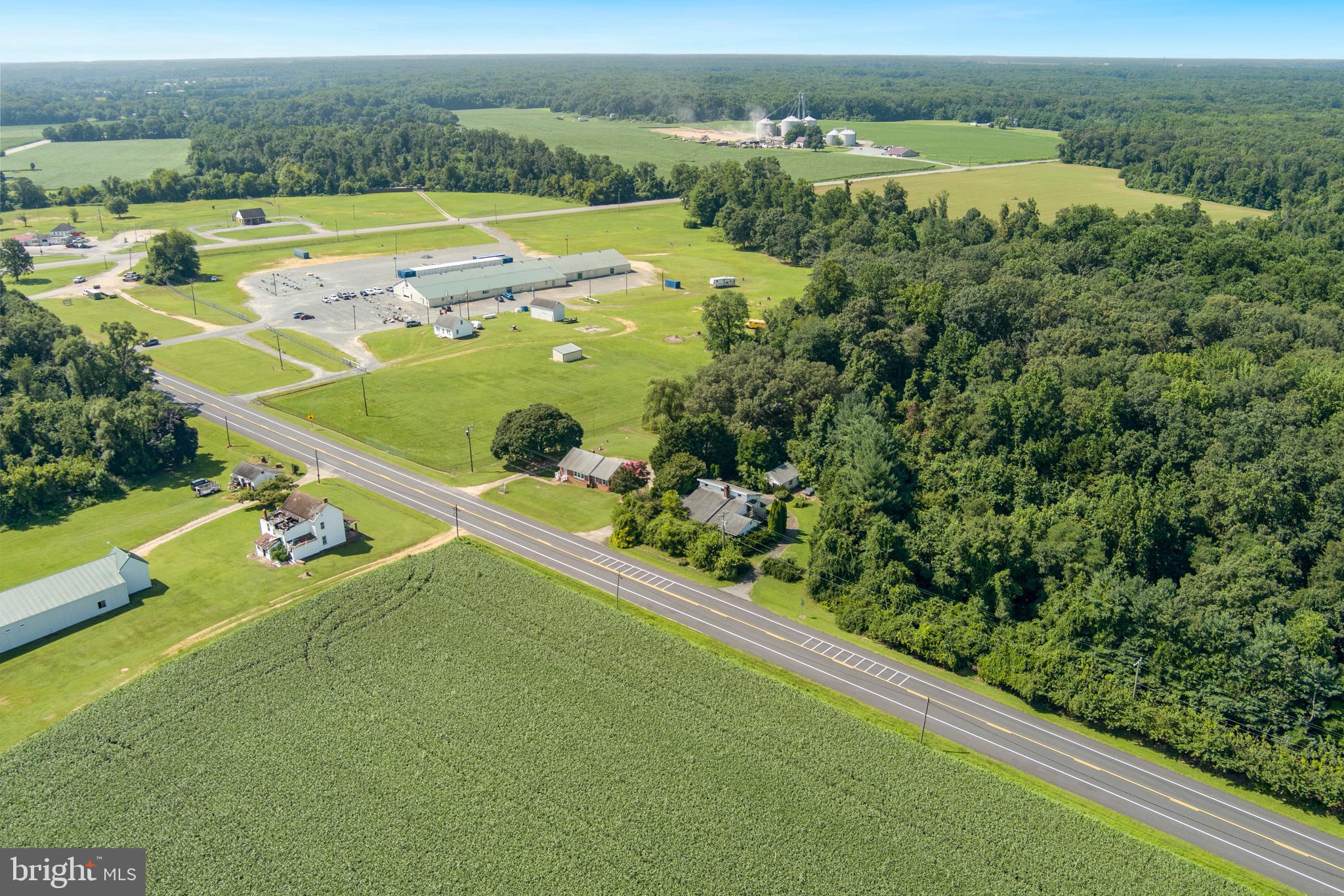 2101 Dudley Corners Road Crumpton, MD 21628 - Photo 38 of 40 an aerial view of a residential houses with outdoor space and trees