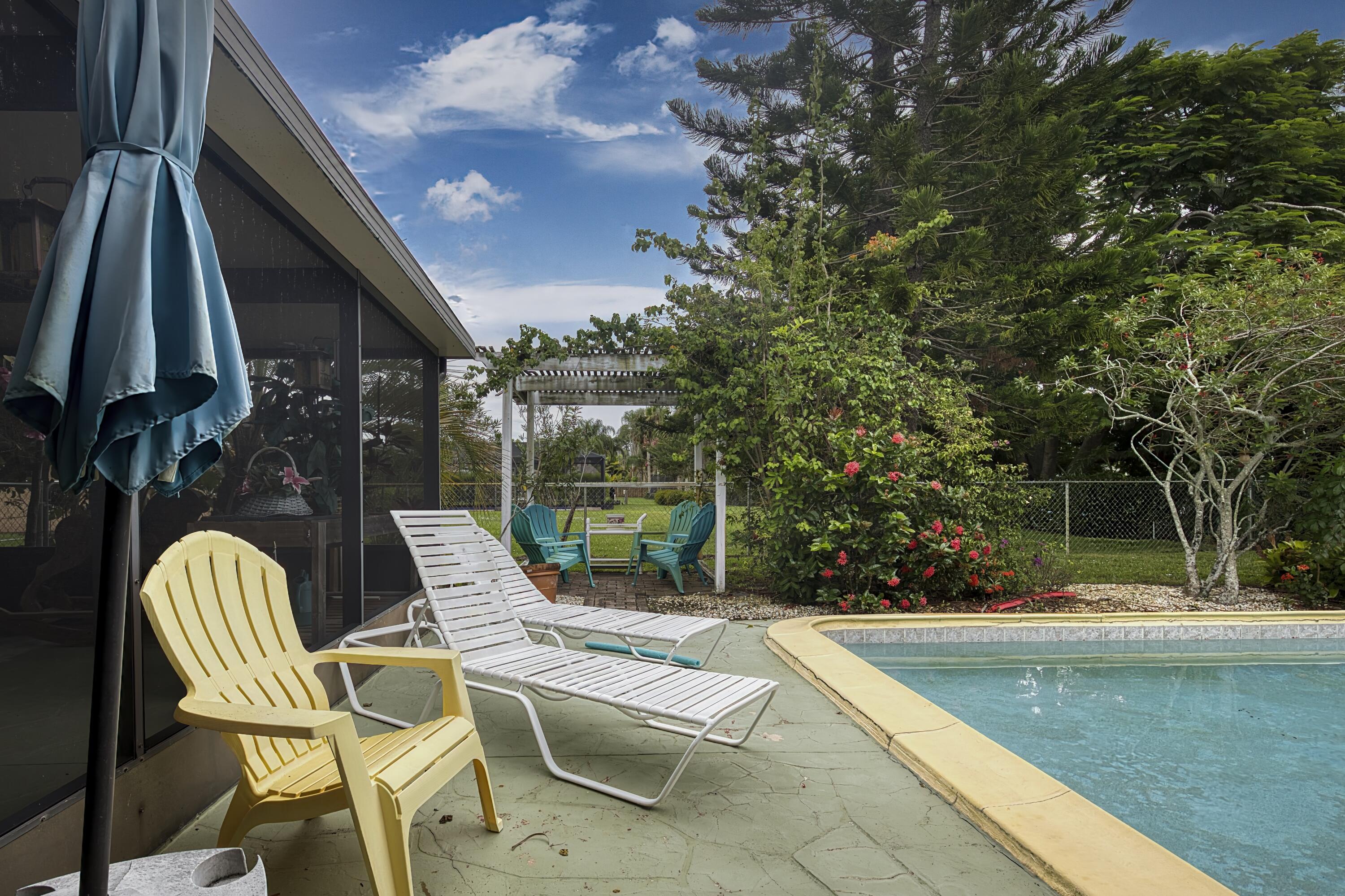 1814 Southeast Erwin Road Port St. Lucie, FL 34952 - Photo 4 of 38 Tropical Peace