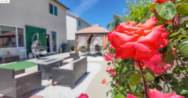 a front view of house with an outdoor seating