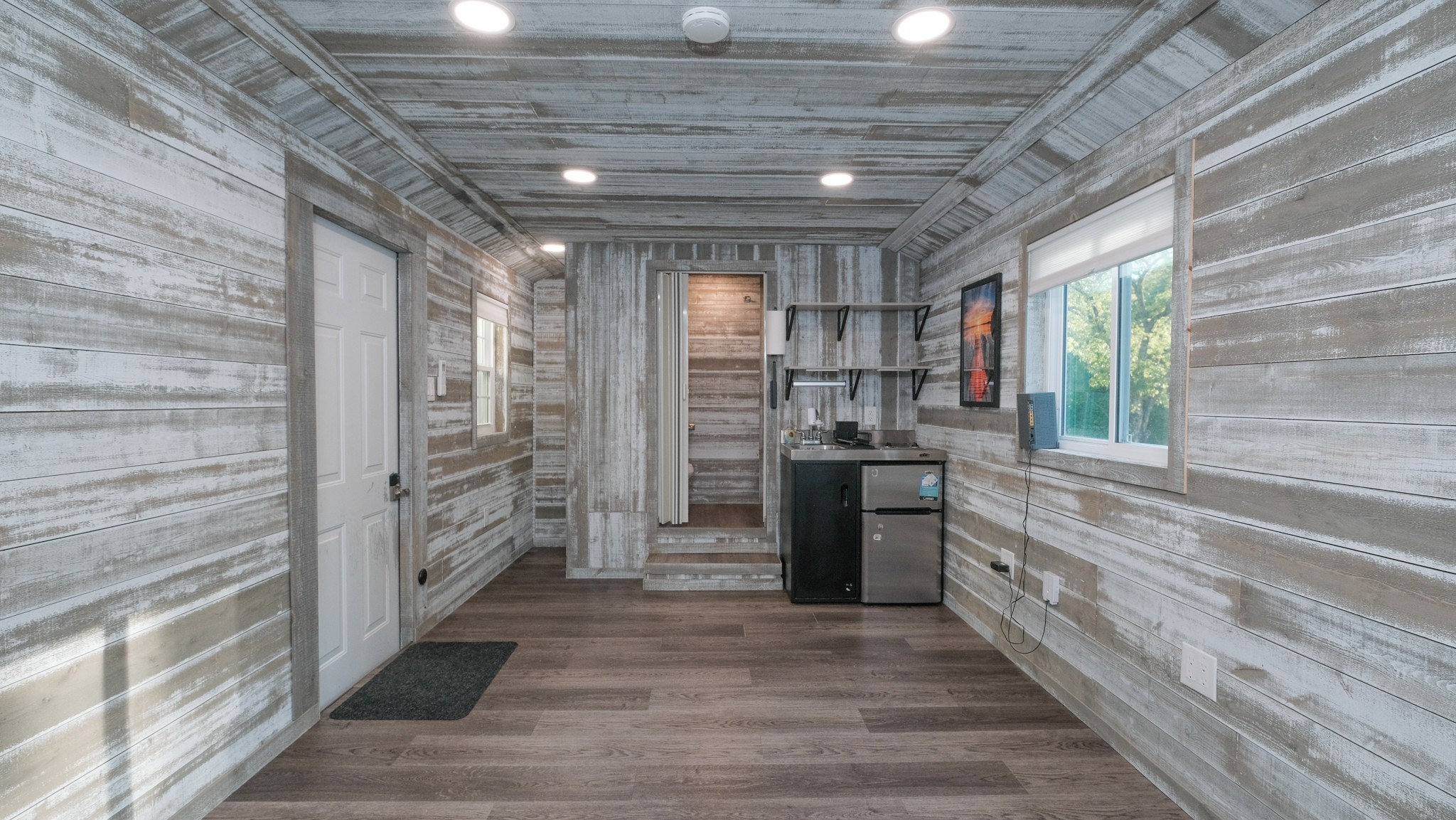 601 Pumpkin Ridge Road Dover, TN 37058 - Photo 20 of 50 a bathroom with a sink and stainless steel appliances