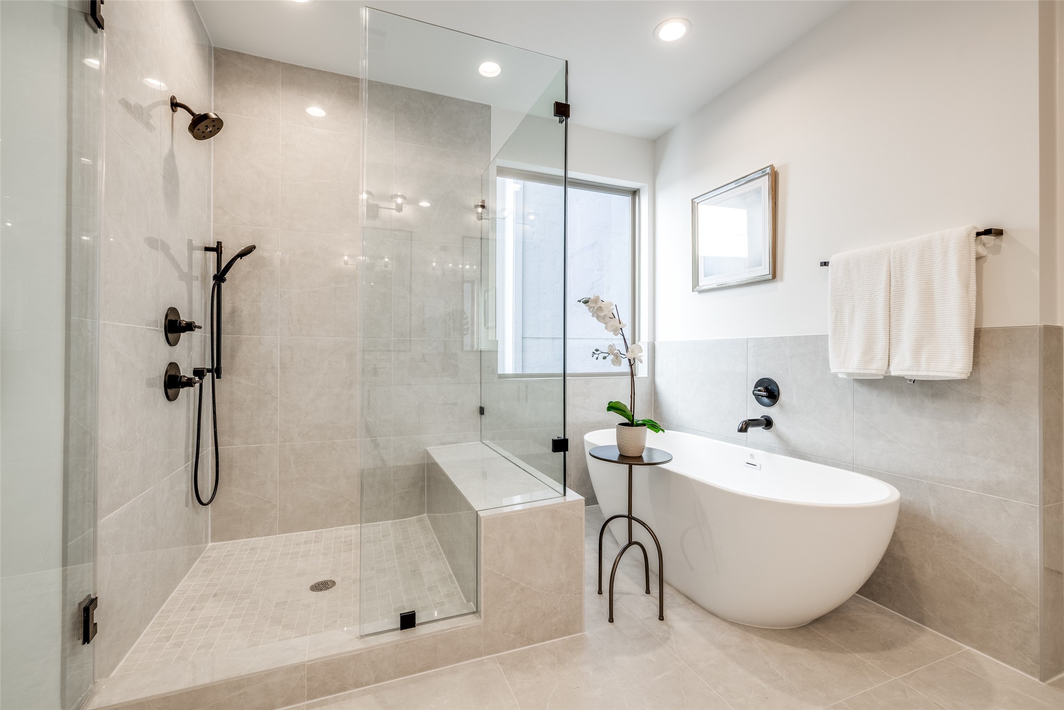 2630 Peckham Street Houston, TX 77098 - Photo 27 of 40 a bathroom with a bathtub and a shower