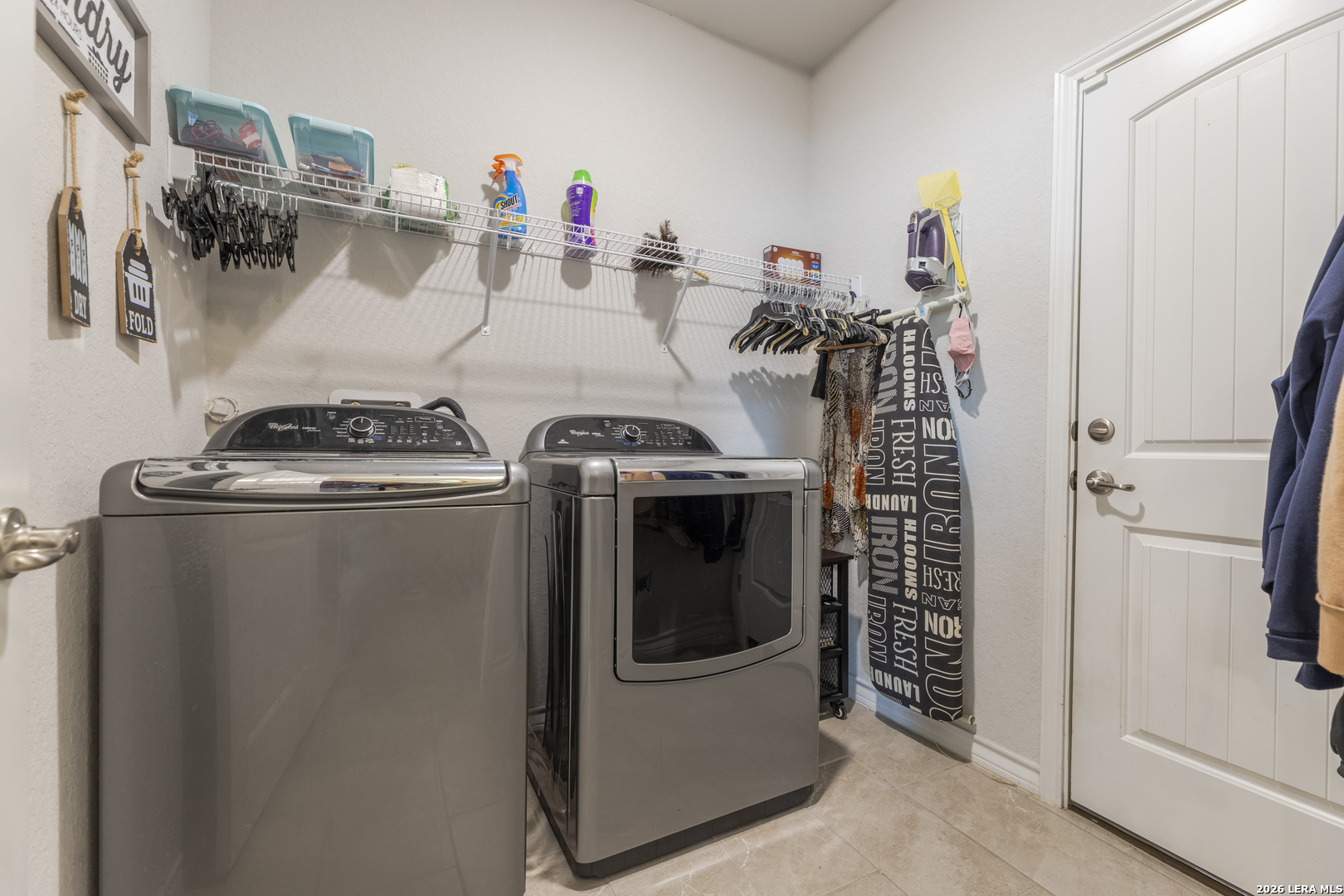 133 Grand View Floresville, TX 78114 - Photo 16 of 43 a utility room with dryer and washer