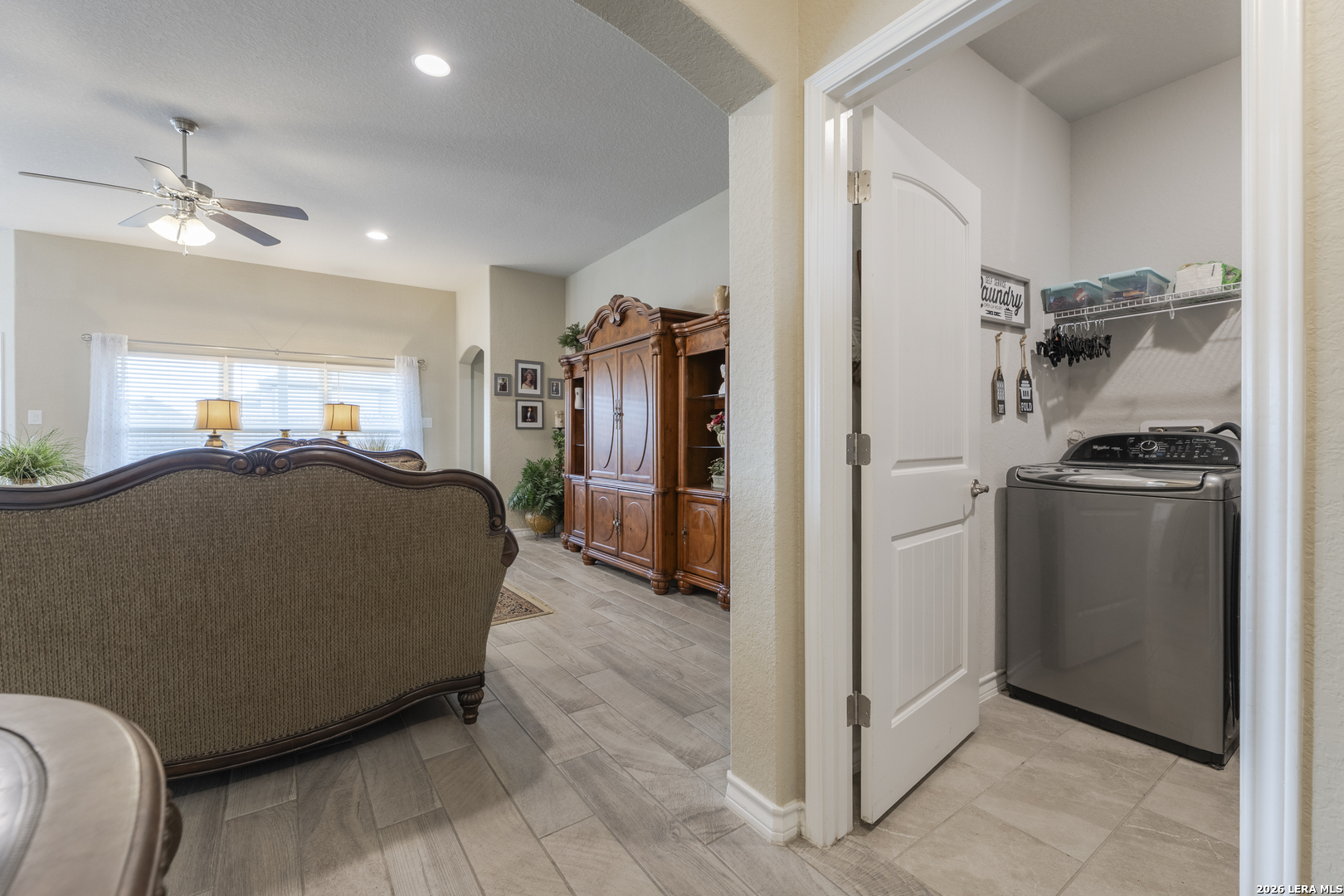 133 Grand View Floresville, TX 78114 - Photo 17 of 43 a bed room with a bed and cabinets
