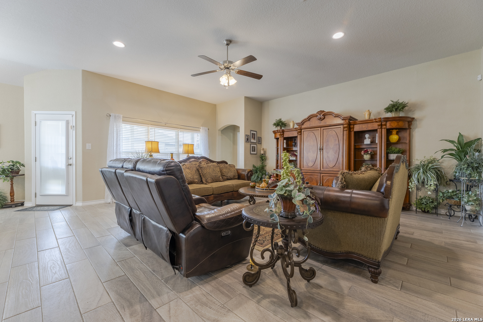 133 Grand View Floresville, TX 78114 - Photo 27 of 43 a living room with furniture and a chandelier