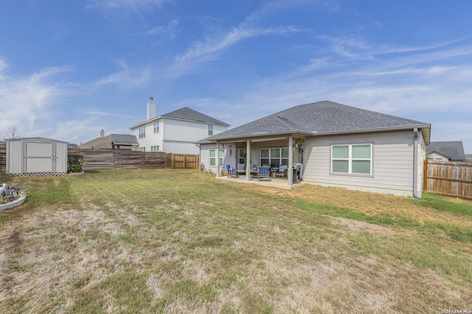 133 Grand View Floresville, TX 78114 - Photo 31 of 43 a front view of a house with a garden