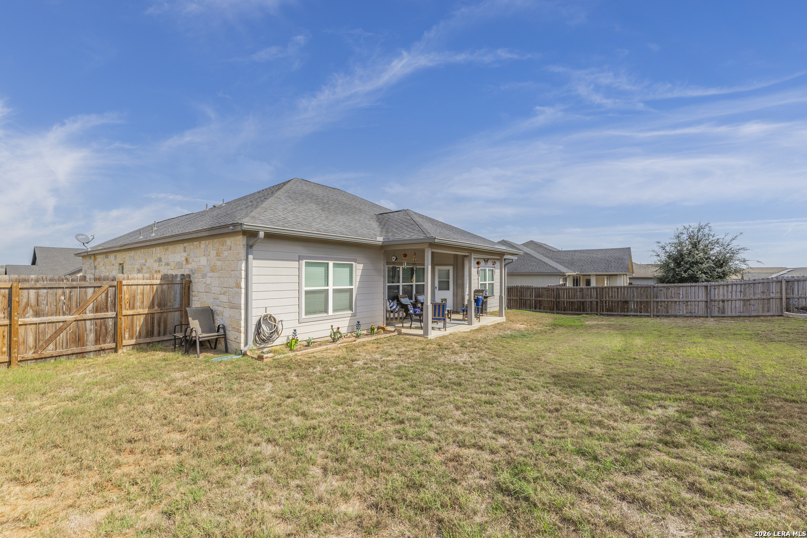 133 Grand View Floresville, TX 78114 - Photo 32 of 43 a house with swimming pool in front of it