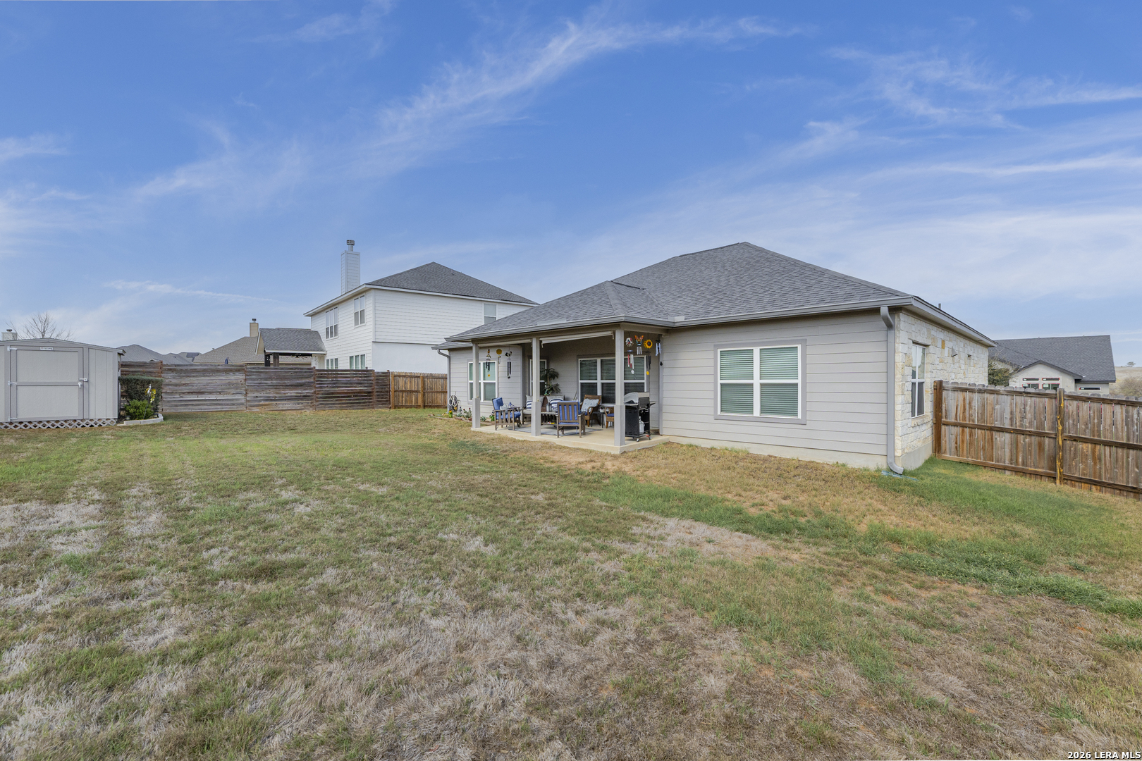 133 Grand View Floresville, TX 78114 - Photo 33 of 43 a view of a house with backyard and garden