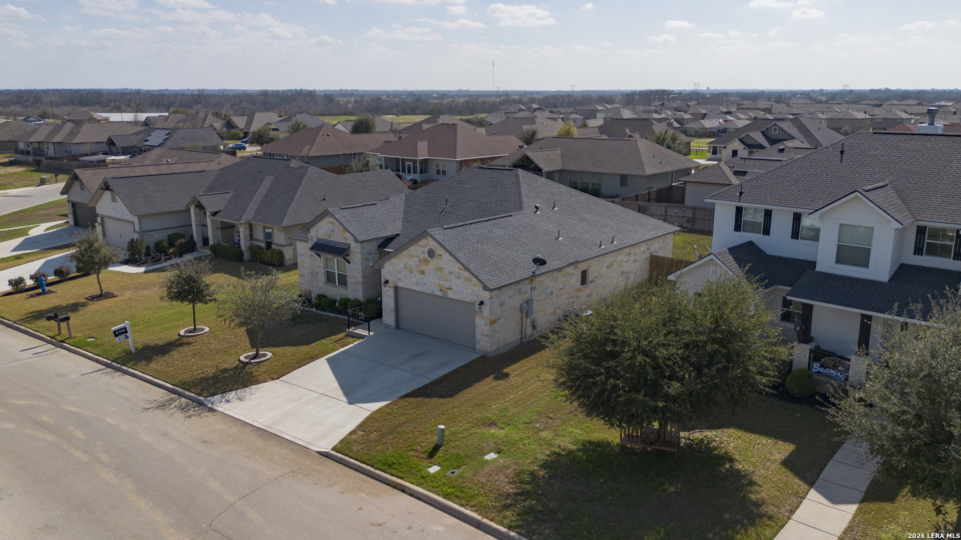 133 Grand View Floresville, TX 78114 - Photo 36 of 43 an aerial view of multiple houses