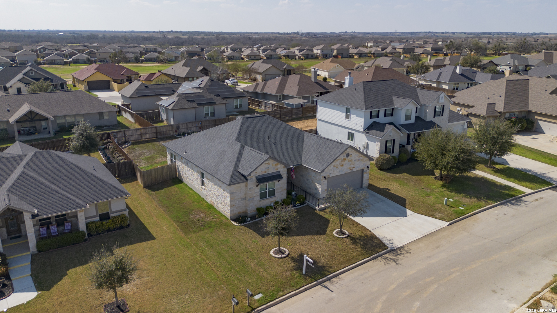133 Grand View Floresville, TX 78114 - Photo 37 of 43 an aerial view of a house with a garden