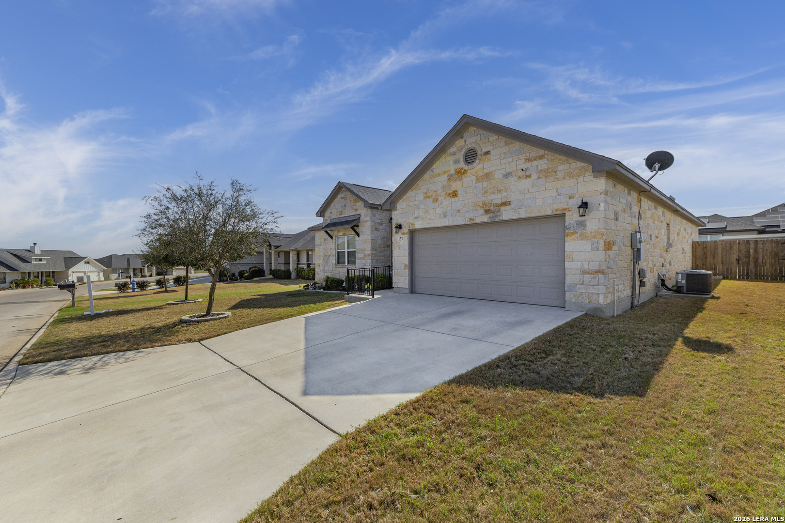 133 Grand View Floresville, TX 78114 - Photo 41 of 43 a view of garage and yard