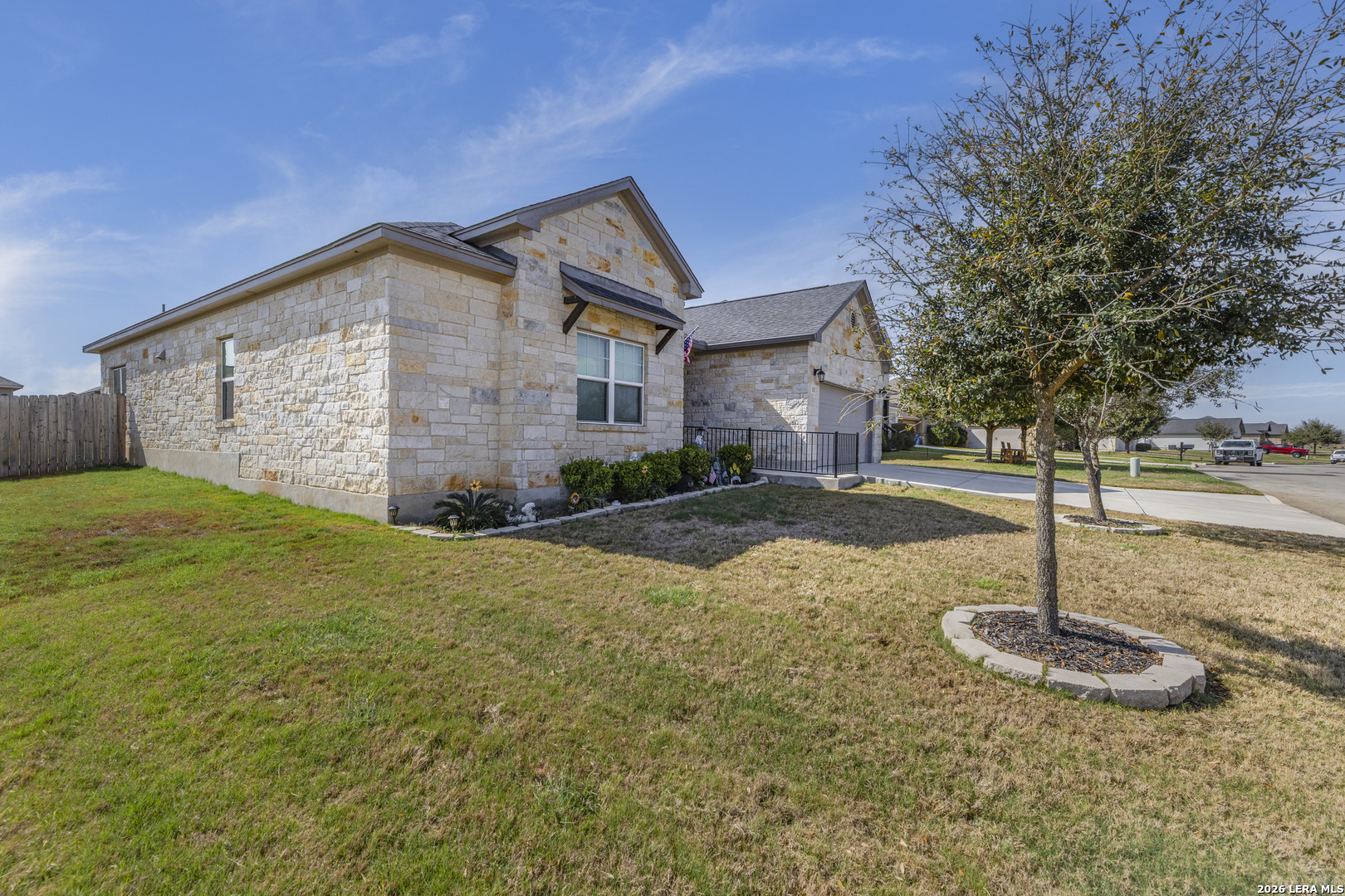 133 Grand View Floresville, TX 78114 - Photo 43 of 43 a front view of a house with a yard