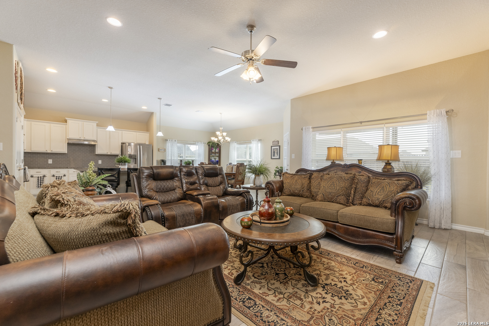 133 Grand View Floresville, TX 78114 - Photo 6 of 43 a living room with furniture and a table