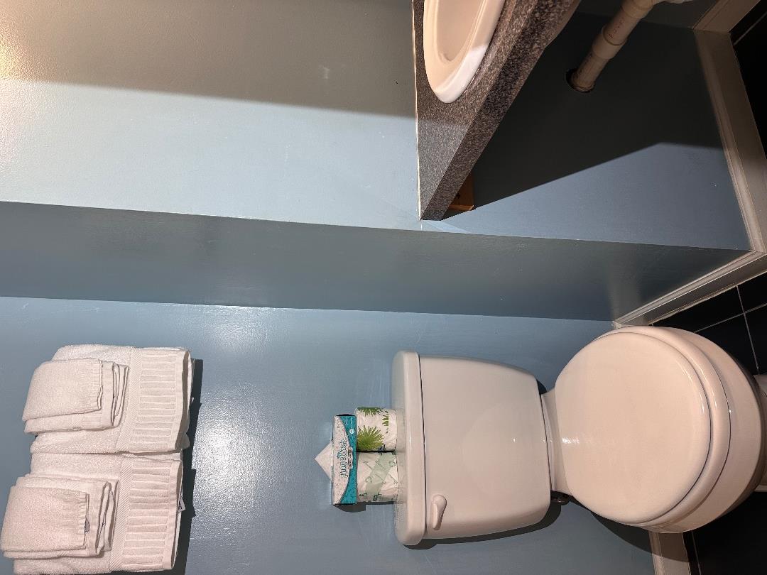 21 Island Inn Road, Unit 39G Oak Bluffs, MA 02557 - Photo 11 of 31 a bathroom with a toilet and a sink