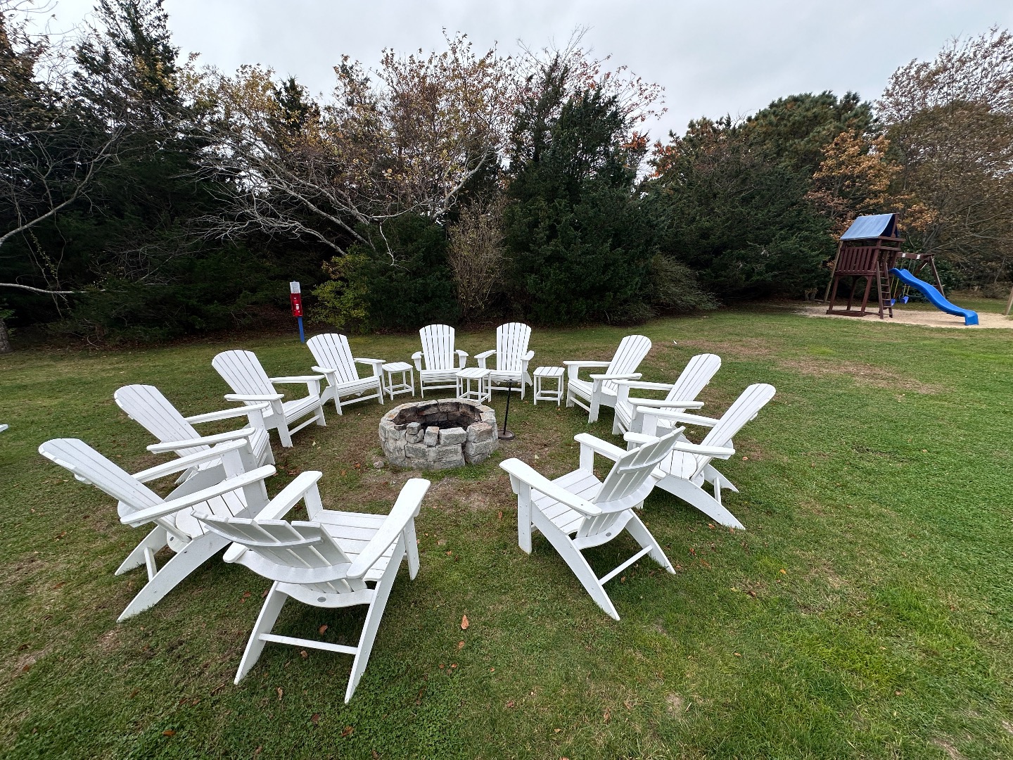 21 Island Inn Road, Unit 39G Oak Bluffs, MA 02557 - Photo 29 of 31 a patio with a yard table and chairs