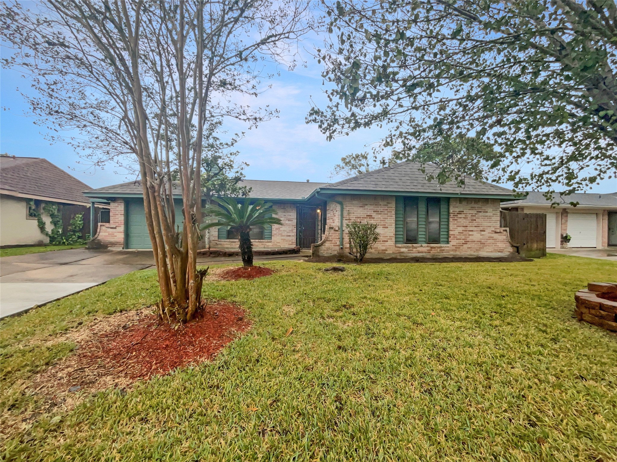 12107 Pompton Drive Houston, TX 77089 - Photo 1 of 23 a front view of a house with a yard
