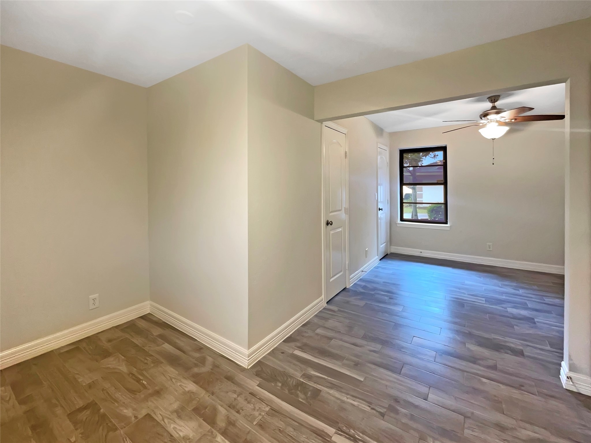12107 Pompton Drive Houston, TX 77089 - Photo 18 of 23 a view of empty room with wooden floor and fan