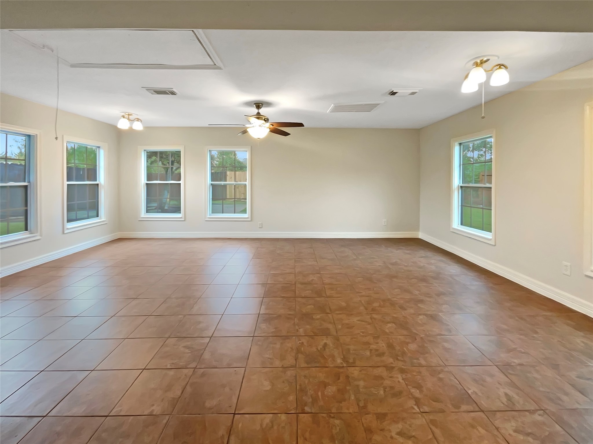 12107 Pompton Drive Houston, TX 77089 - Photo 3 of 23 a view of an empty room with a window