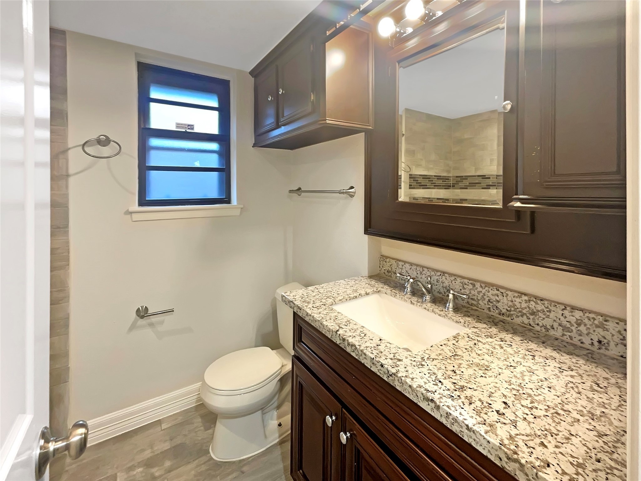 12107 Pompton Drive Houston, TX 77089 - Photo 6 of 23 a bathroom with a granite countertop sink toilet and shower