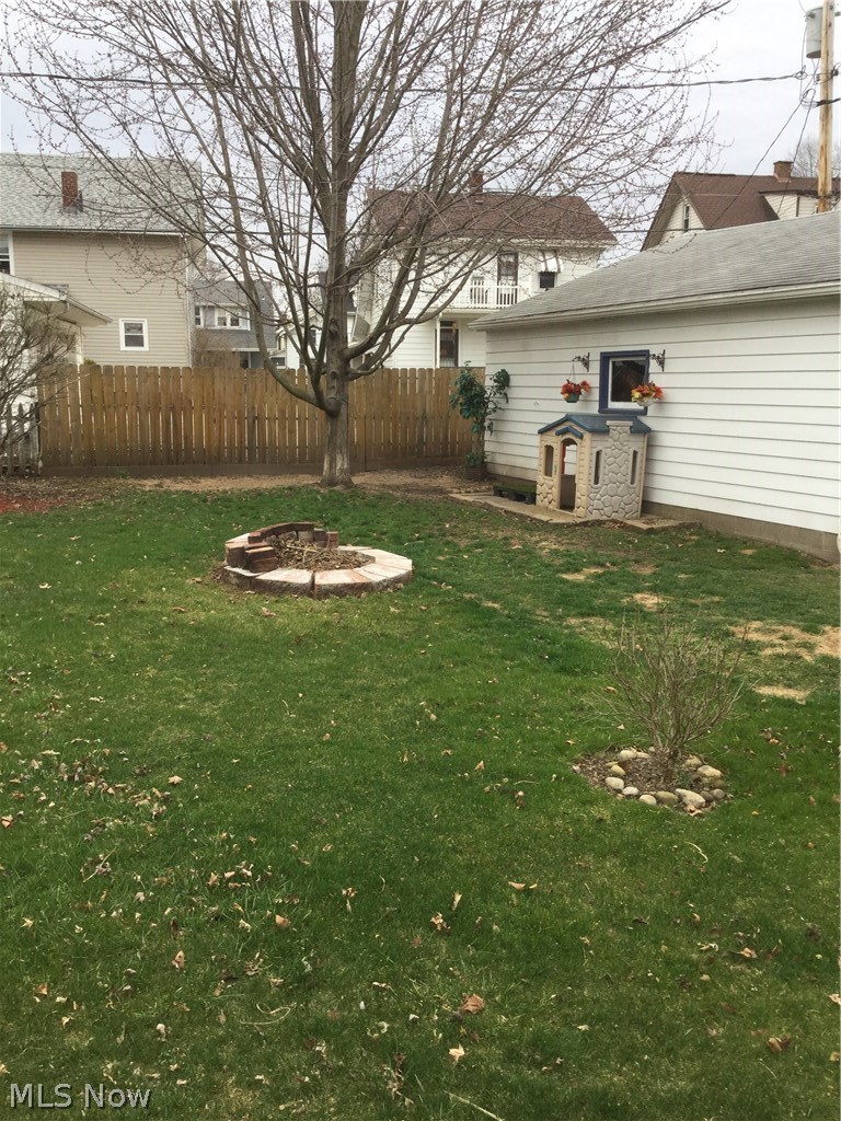 922 Ridge Road Northwest Canton, OH 44703 - Photo 18 of 18 Backyard with firepit