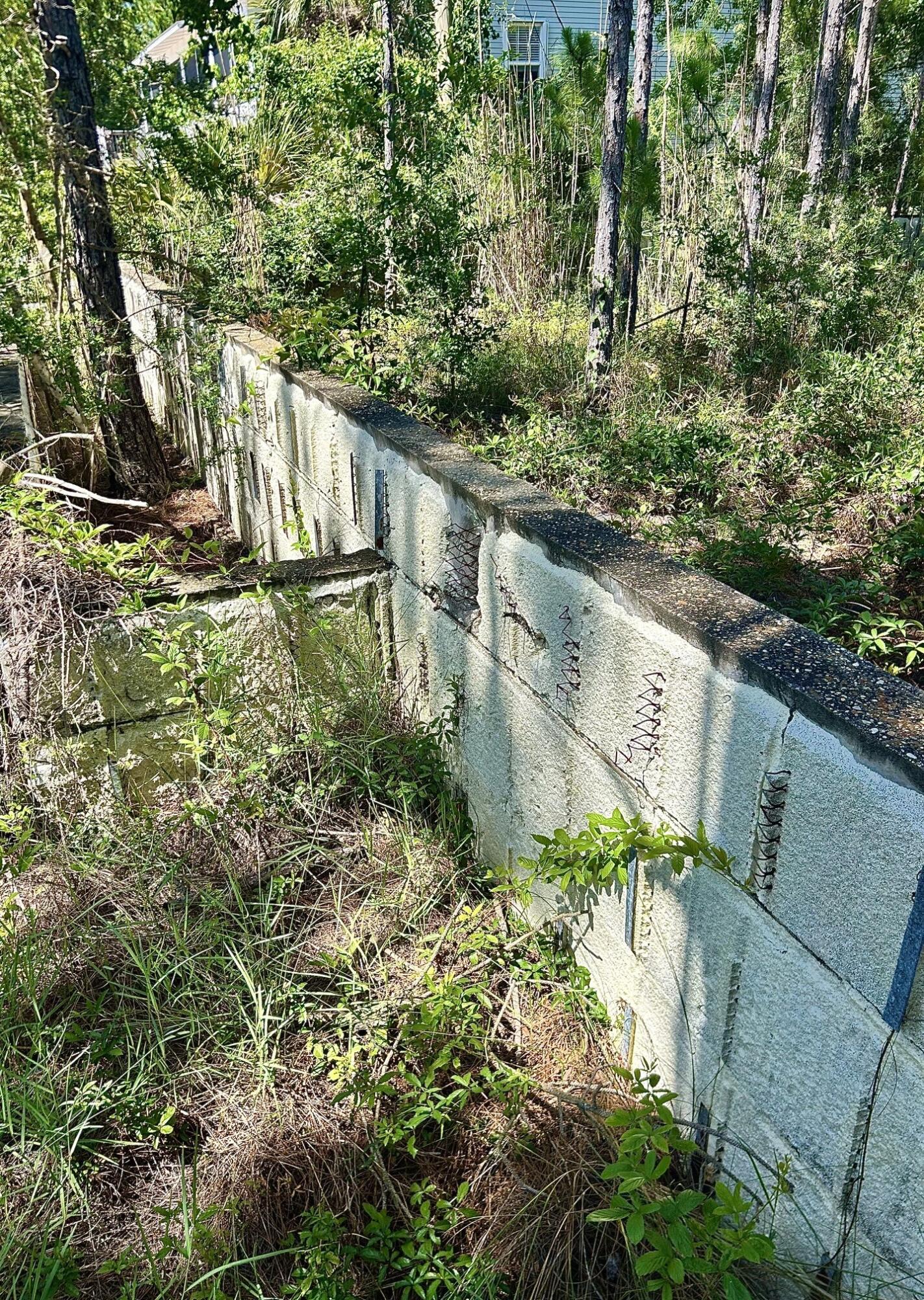 1021 Pearson Road Milton, FL 32583 - Photo 9 of 12 a view of a garden with a bench