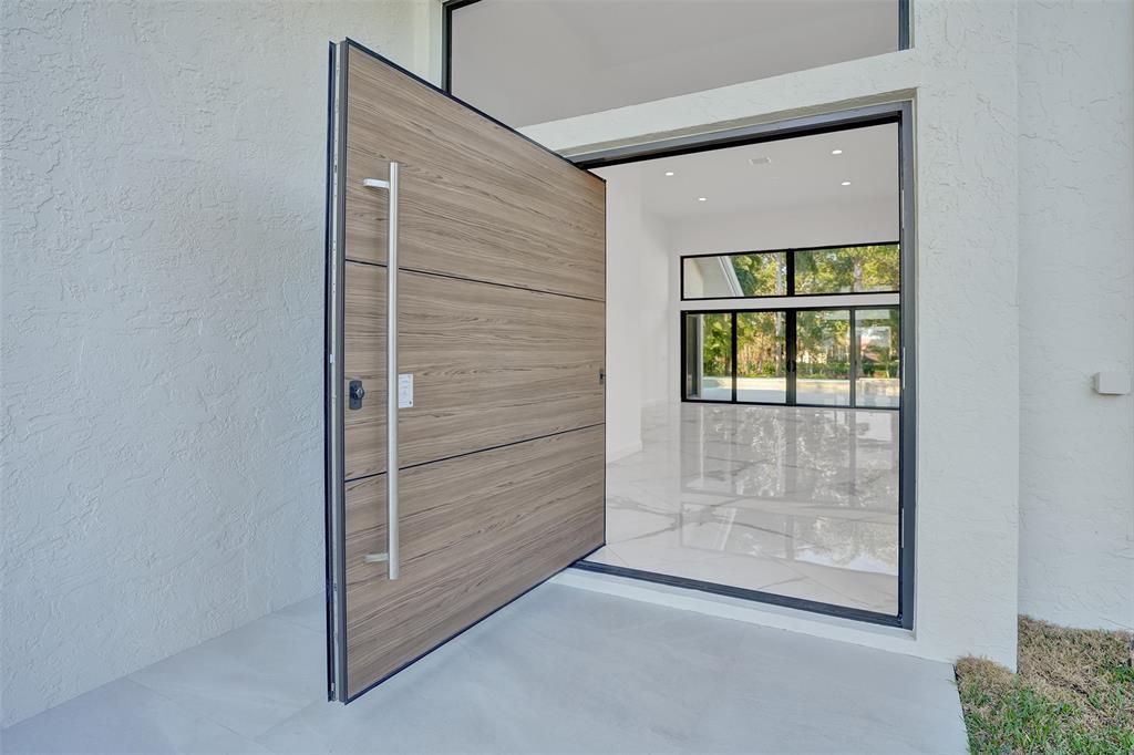 4701 Pine Tree Drive Boynton Beach, FL 33436 - Photo 4 of 76 a view of front door