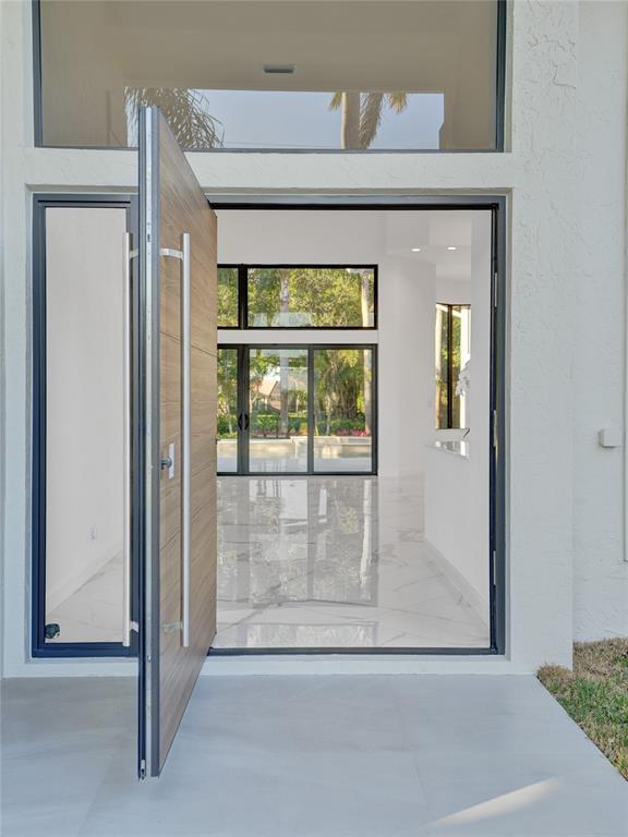 4701 Pine Tree Drive Boynton Beach, FL 33436 - Photo 62 of 76 a view of front door