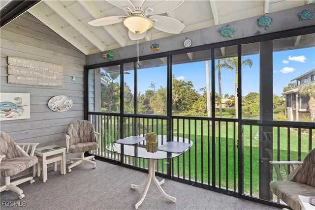 a view of a porch with furniture