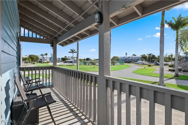 a view of a street from a balcony