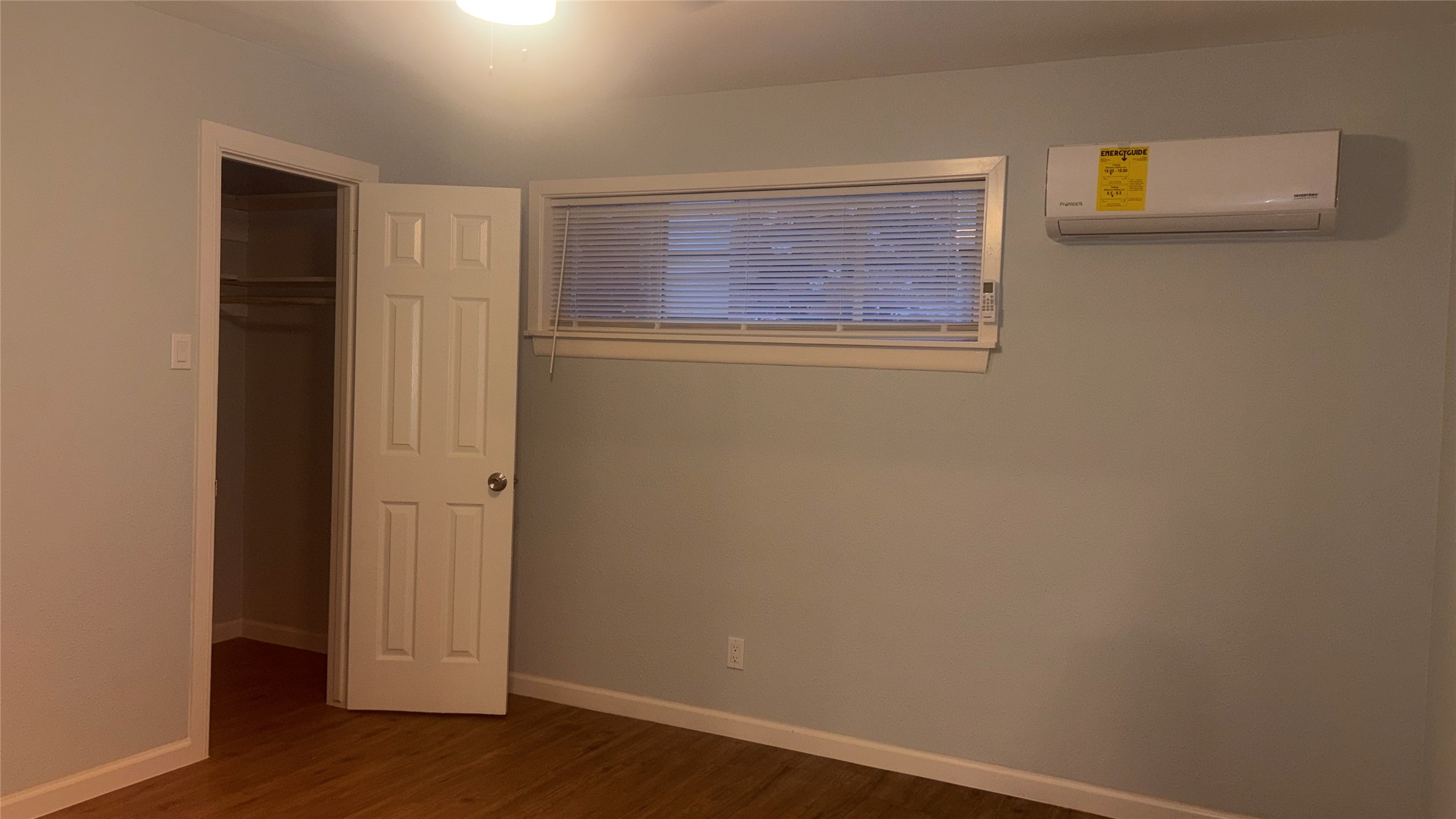 4624 Bell Street, Unit 2 Houston, TX 77023 - Photo 6 of 10 a view of empty room with wooden floor