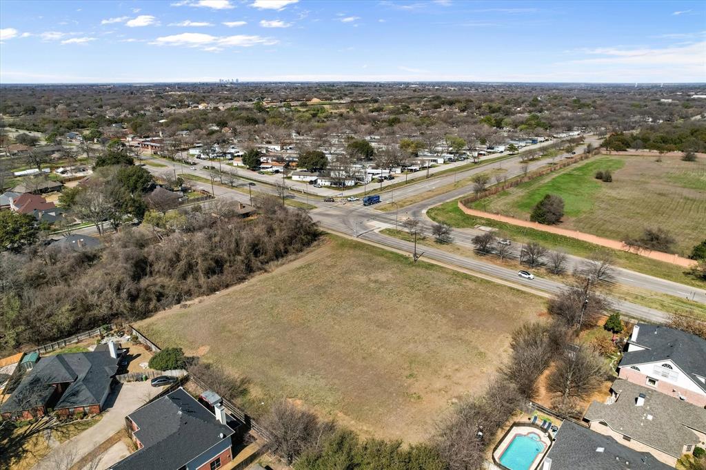 2400 West Sublett Road Arlington, TX 76001 - Photo 2 of 8 an aerial view of residential houses with outdoor space
