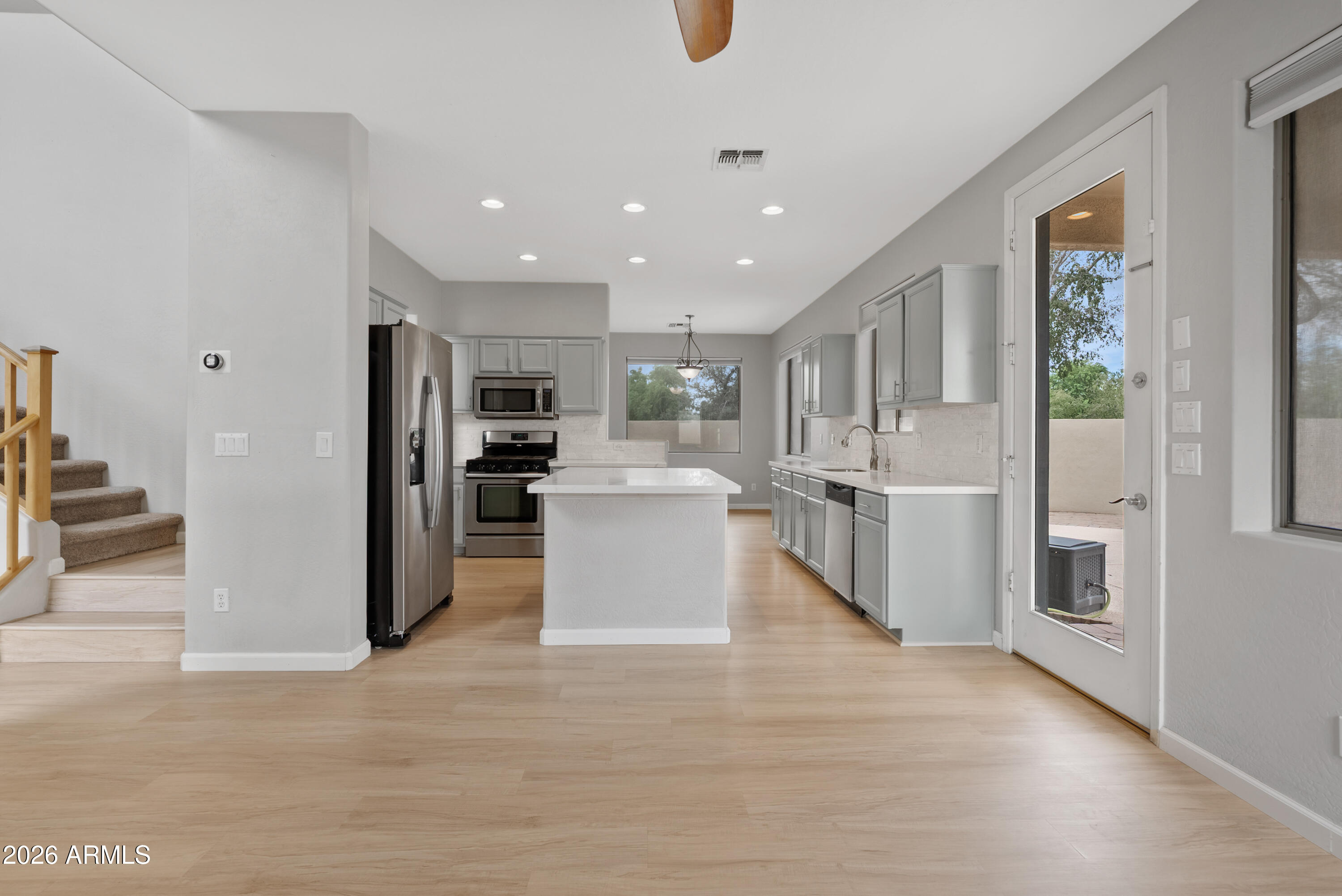 6280 South Sinova Court Gilbert, AZ 85298 - Photo 14 of 58 Family room open to the kitchen