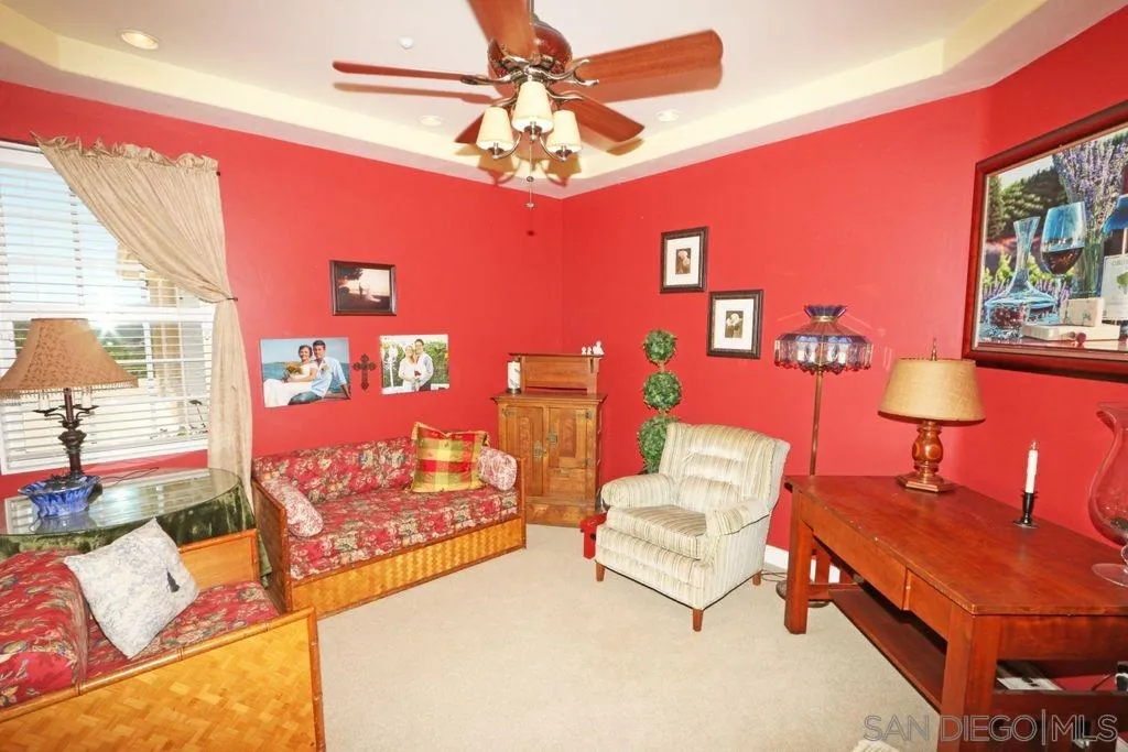 24568 Rutherford Road Ramona, CA 92065 - Photo 14 of 25 a living room with furniture and a flat screen tv