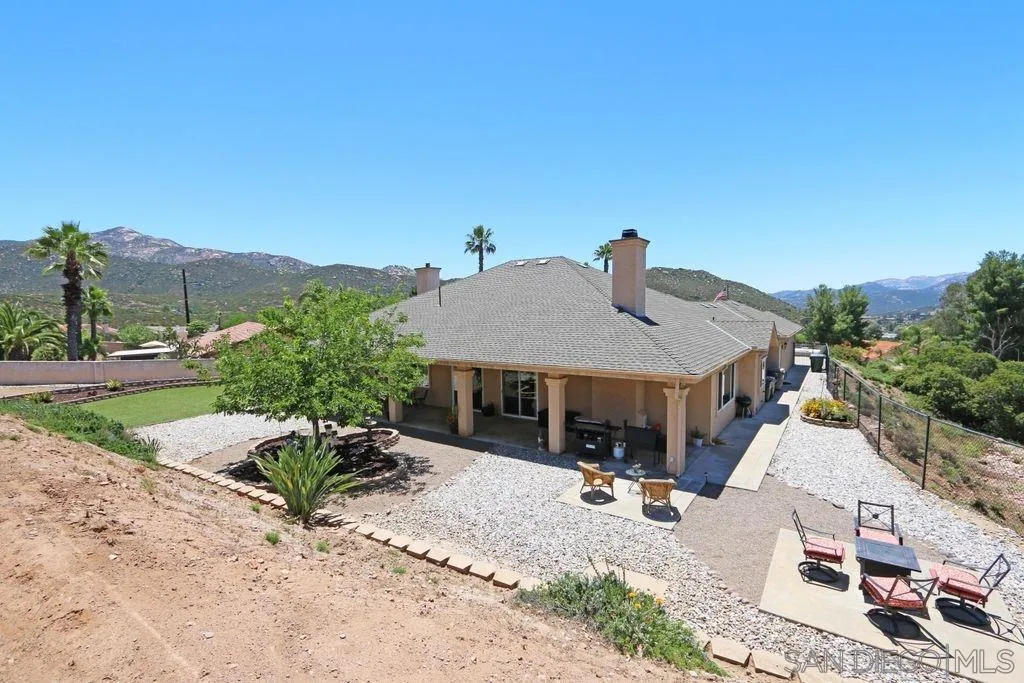 24568 Rutherford Road Ramona, CA 92065 - Photo 4 of 25 a view of a house with backyard and sitting area