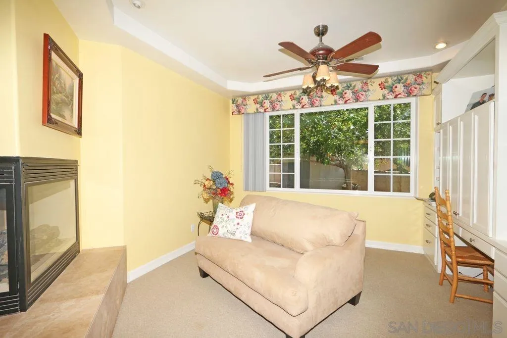 24568 Rutherford Road Ramona, CA 92065 - Photo 10 of 25 a living room with furniture and a large window